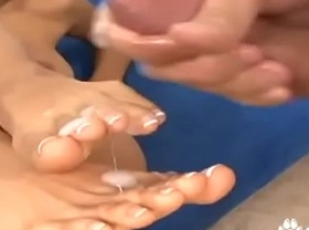 Casandra cruz gives a footjob and ends up with her toes covered in cum